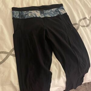 Lululemon. Navy blue full length Leggings. side leg pockets & small back pocket